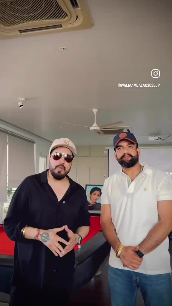 Mika Singh with the developer at the Jayanti Majri project launch